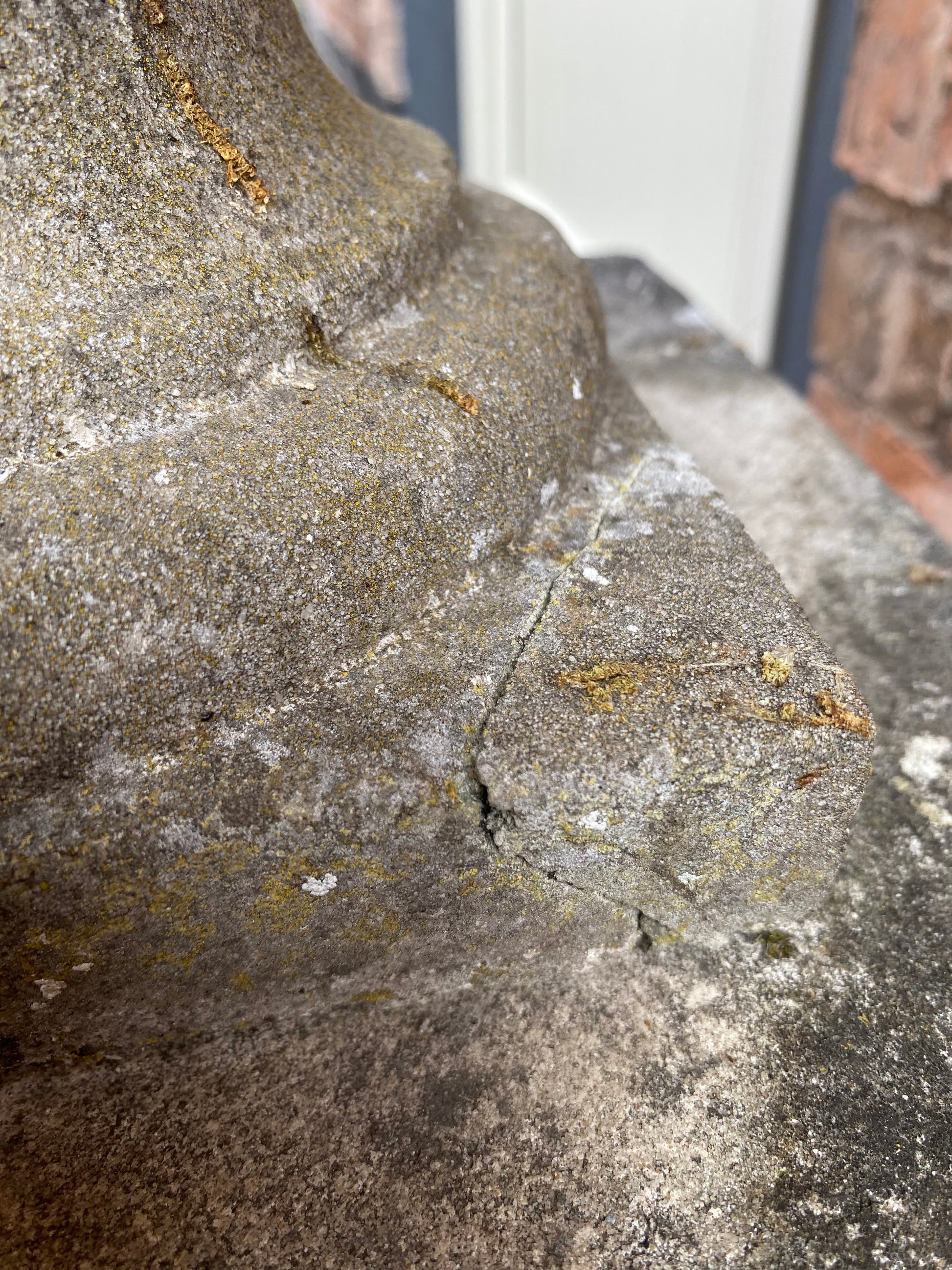 Close-up of a stone urn with old previously repaired damage